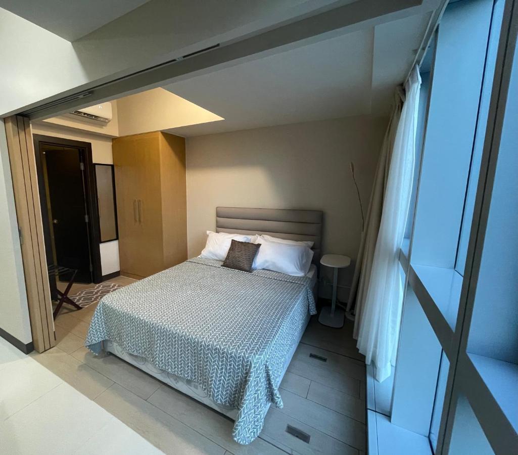 מנילה 1 Bedroom Condo Uptown Parksuites Bgc, High Floor, Morning Sun מראה חיצוני תמונה